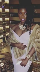 SHE pretty in pink evening gown